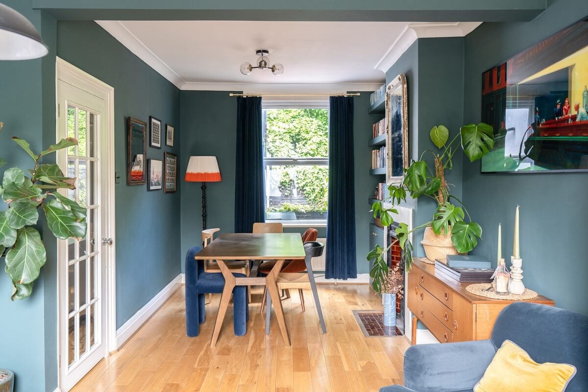 Blue Tones in a Two-Bedroom Victorian Cottage 5 blue living room with dining space