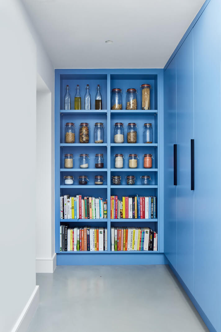 A London Family Home Decorated in Pastel Colors 12 blue open closed cabinets