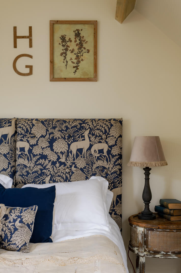 Cottage-Style Interiors in an English Barn Conversion 9 blue patterned headboard