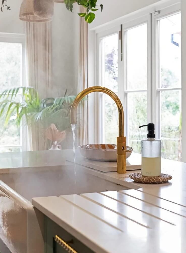 Playful Materials, Textures, and Colors in a London Home 12 brass tap