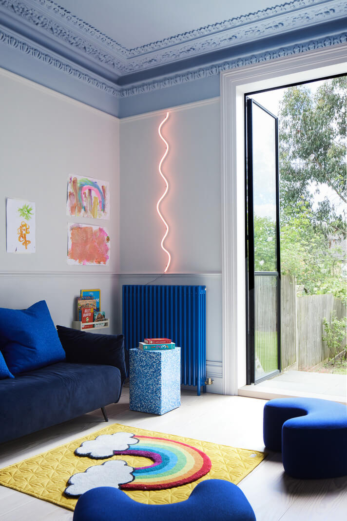 A London Family Home Decorated in Pastel Colors 17 childrens play room with blue ceiling
