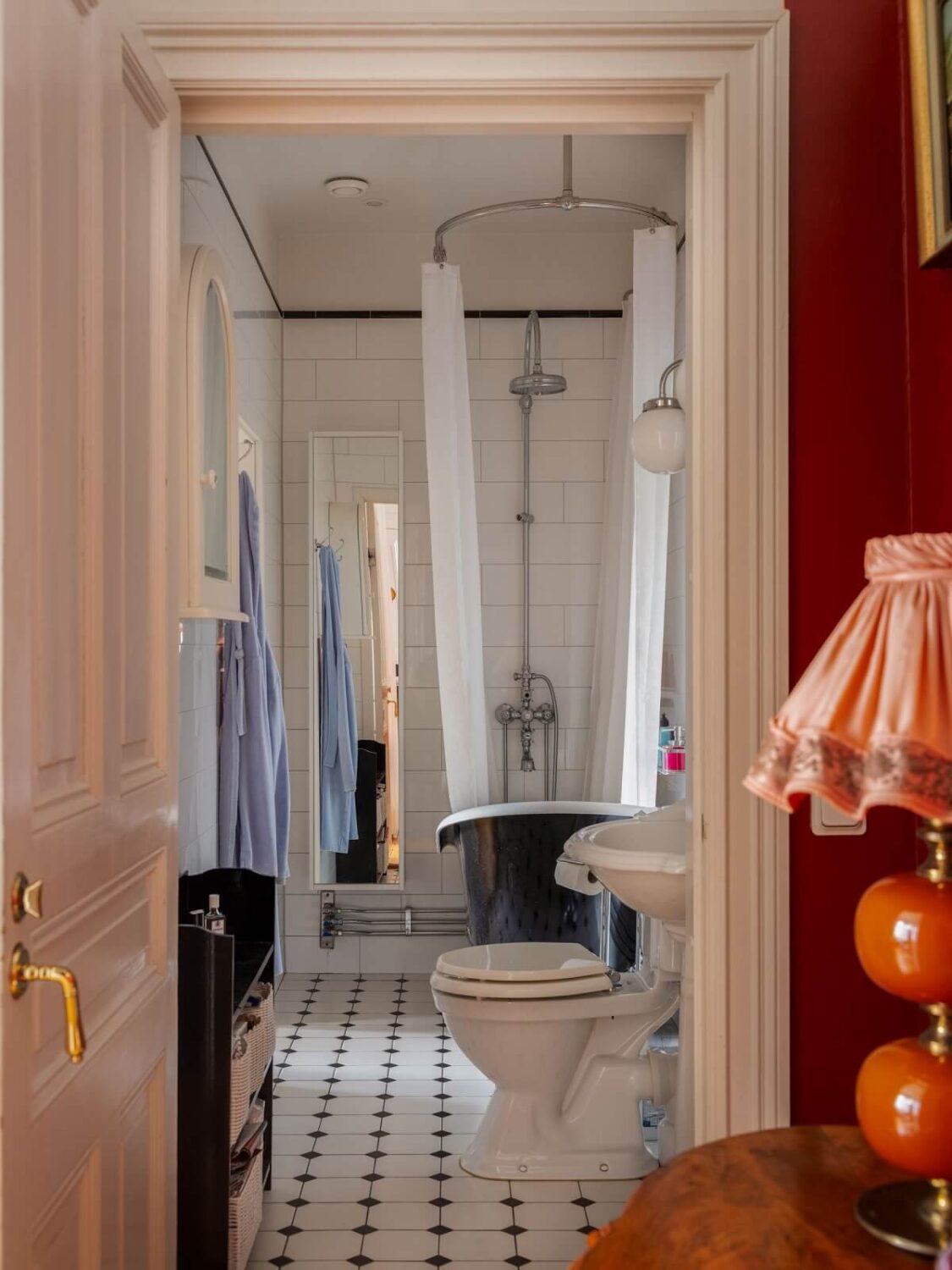 Antique Furniture and Arched Windows in a Stockholm Apartment 19 classic bathroom