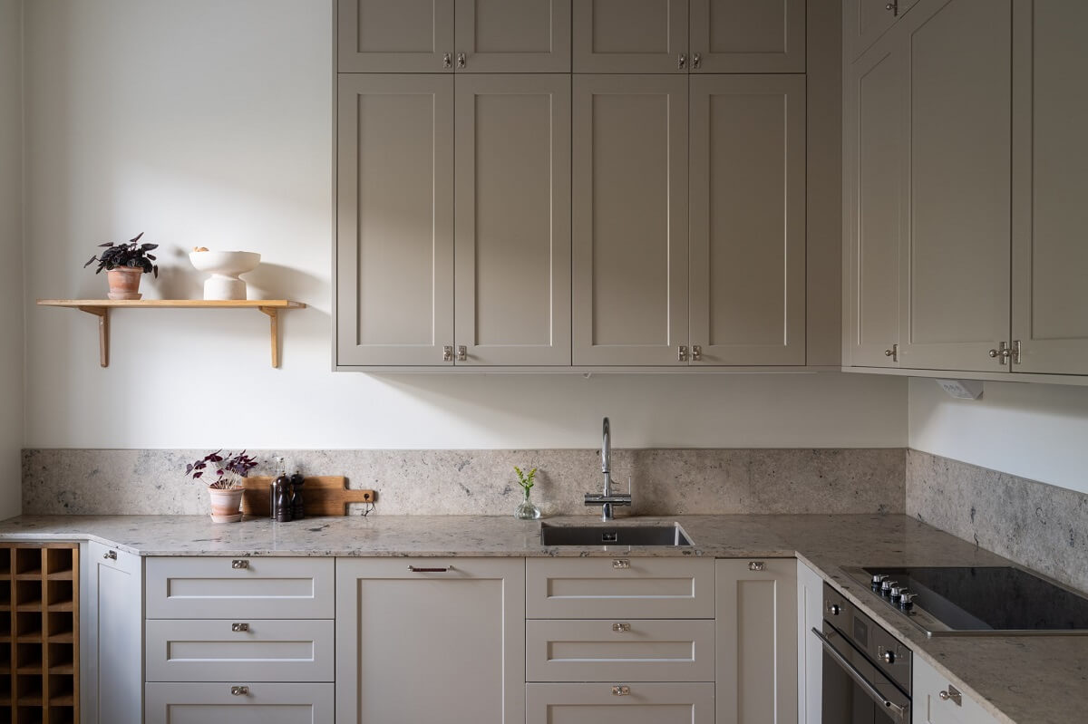 A Renovated Turn-of-the-Century Apartment with Two Bedrooms 11 classic gray cabinets