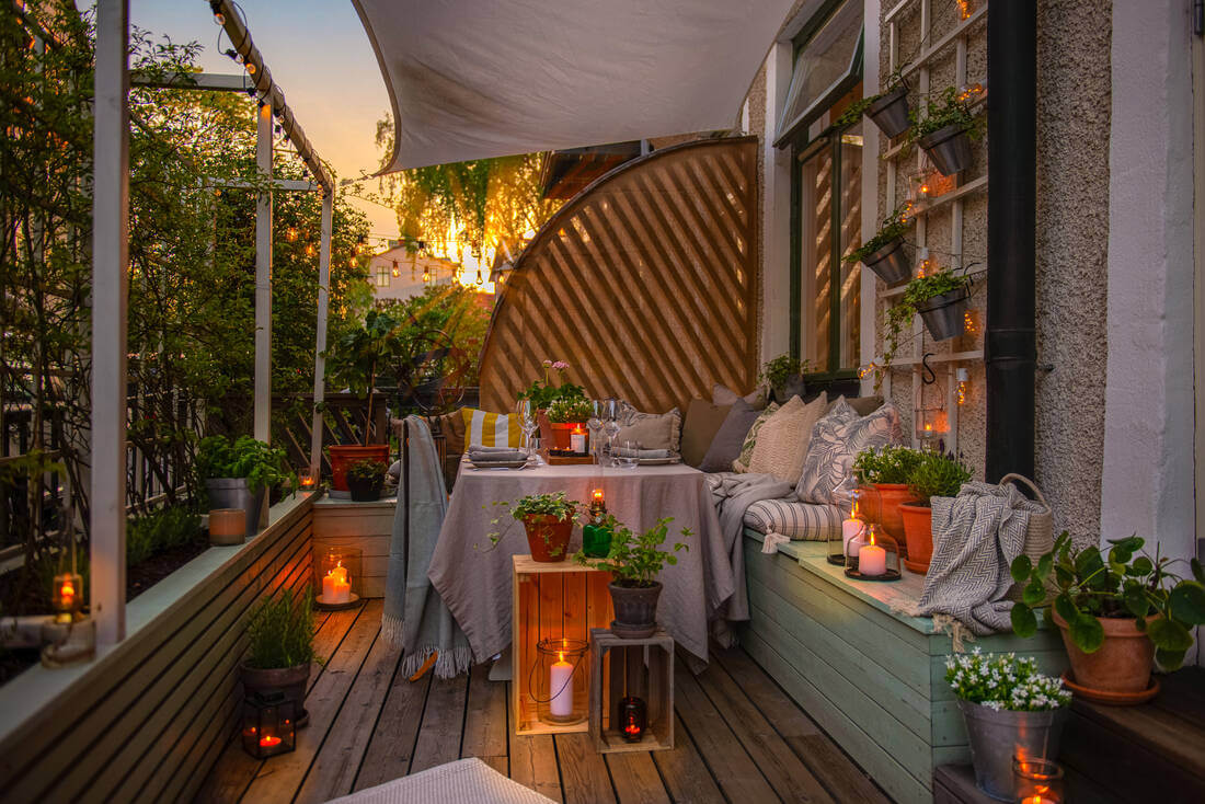 A White Apartment Features a Beautiful Terrace with a View 13 cozy terrace