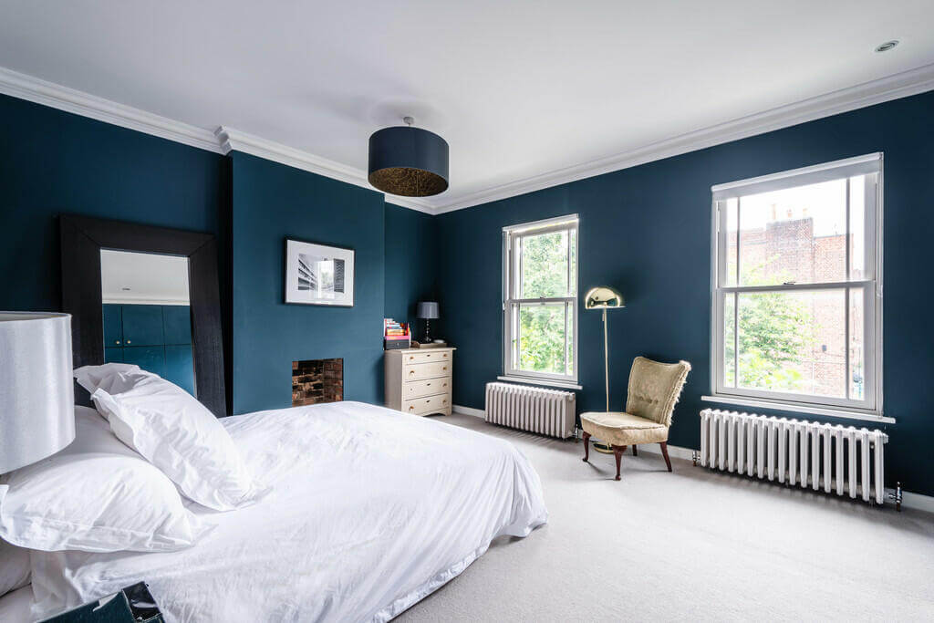 An Open Plan Victorian House with a Lush Green Garden 7 dark blue bedroom An Open Plan Victorian House with a Lush Green Garden