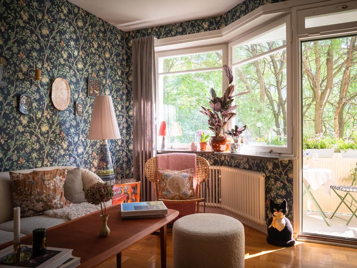 Floral Wallpaper and a Pink Kitchen in a Midcentury Apartment 5 dark floral wallpaper living room