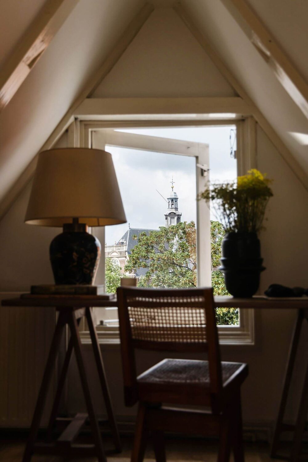 An Apartment with High Pitched Ceilings in an Amsterdam Canal House 19 desk in front of window amsterdam canal house