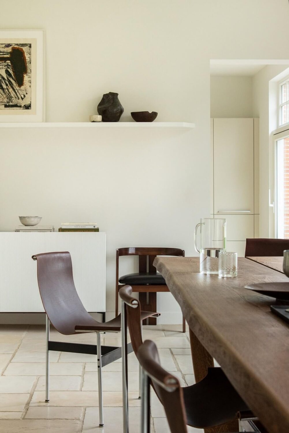 Historic Character and Timeless Elegant Interiors in a Restored Belgian Villa 8 dining room custom dining table