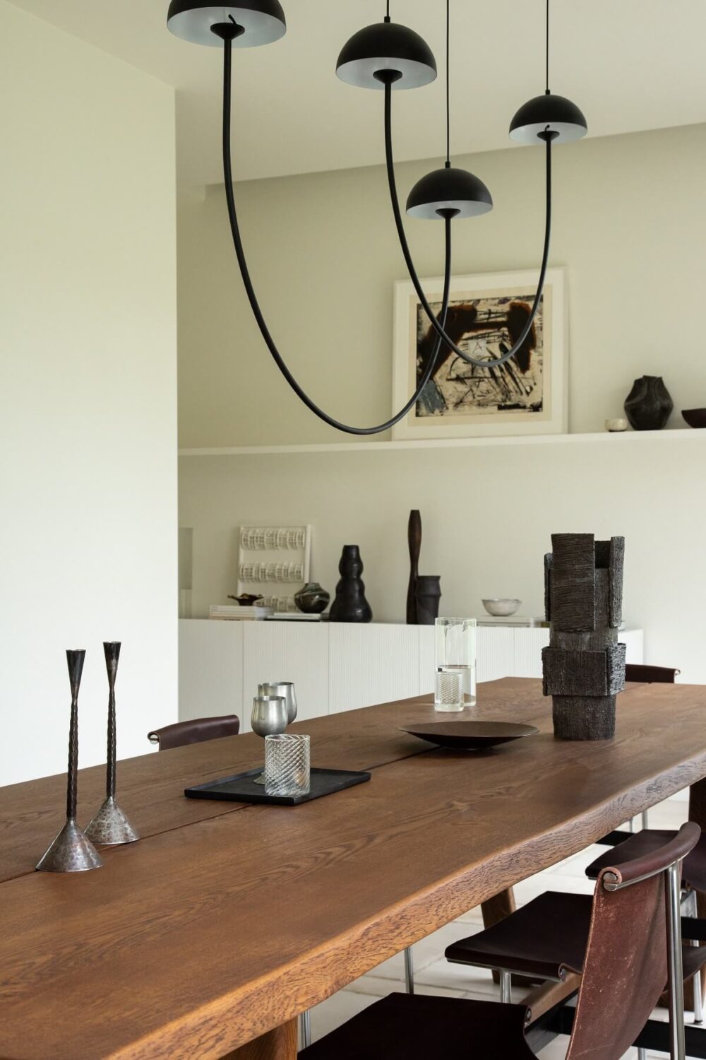 Historic Character and Timeless Elegant Interiors in a Restored Belgian Villa 7 dining room with arched pendant