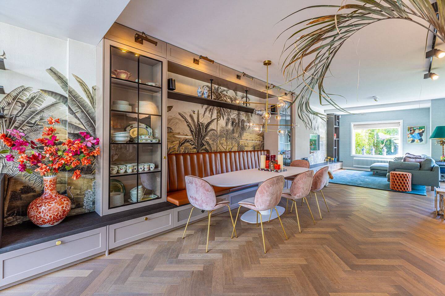 Bold Color Accents in a Dutch Family Home 5 dining space with built in bench wall mural
