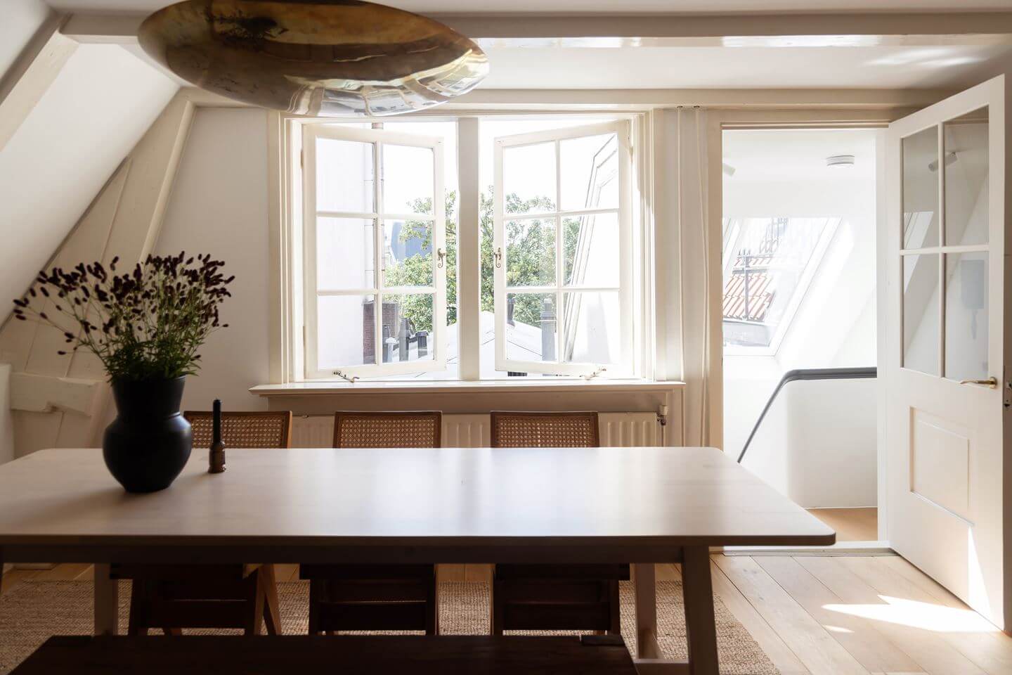 An Apartment with High Pitched Ceilings in an Amsterdam Canal House 8 dining space