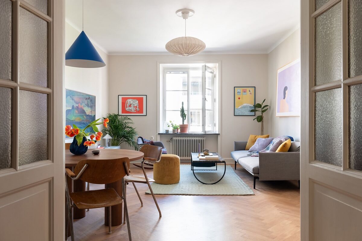 A Renovated Stockholm Apartment with Subtle Color Details 9 double doors to living room
