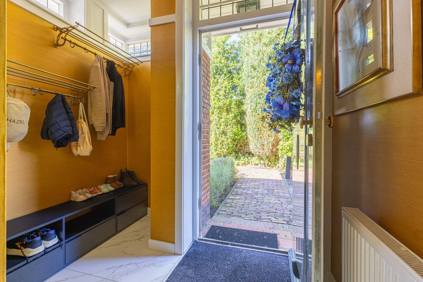 Bold Color Accents in a Dutch Family Home 13 entry bright yellow wallpaper