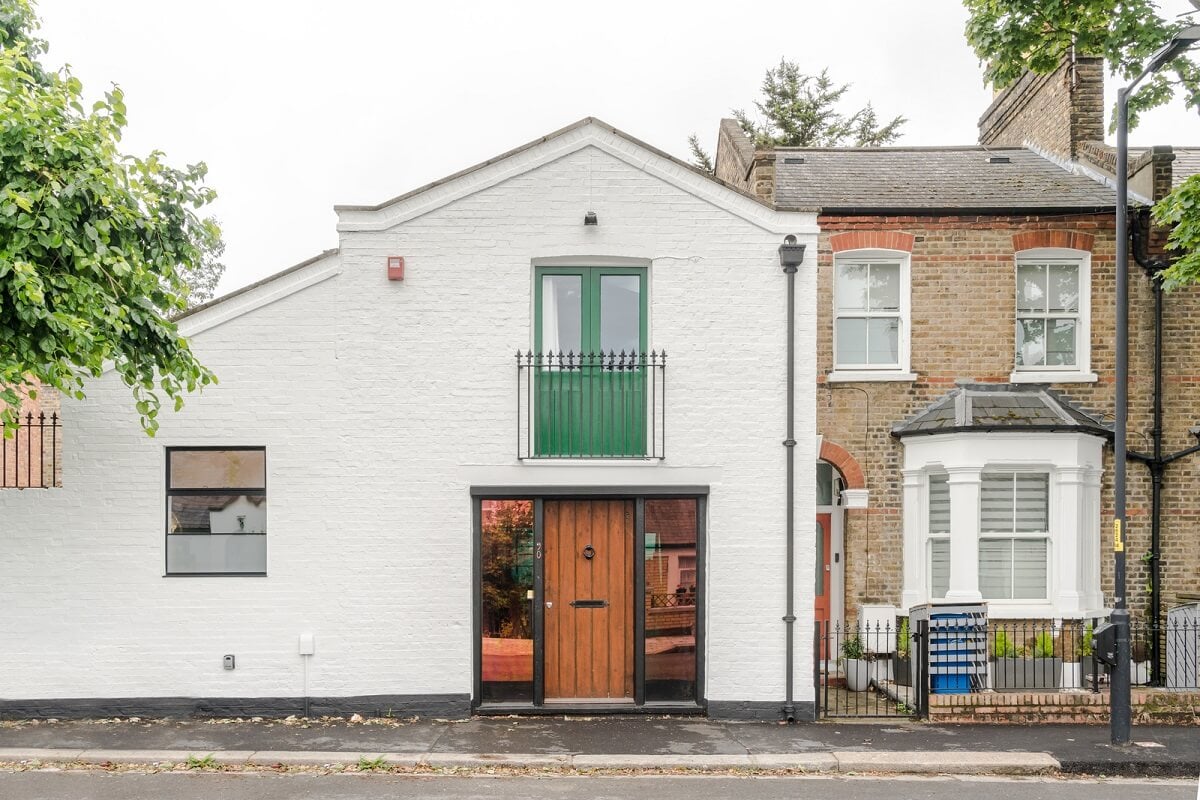 Exposed Materials and Green Tones in a London Stable Conversion 20 facade 1 Exposed Materials and Green Tones in a London Stable Conversion