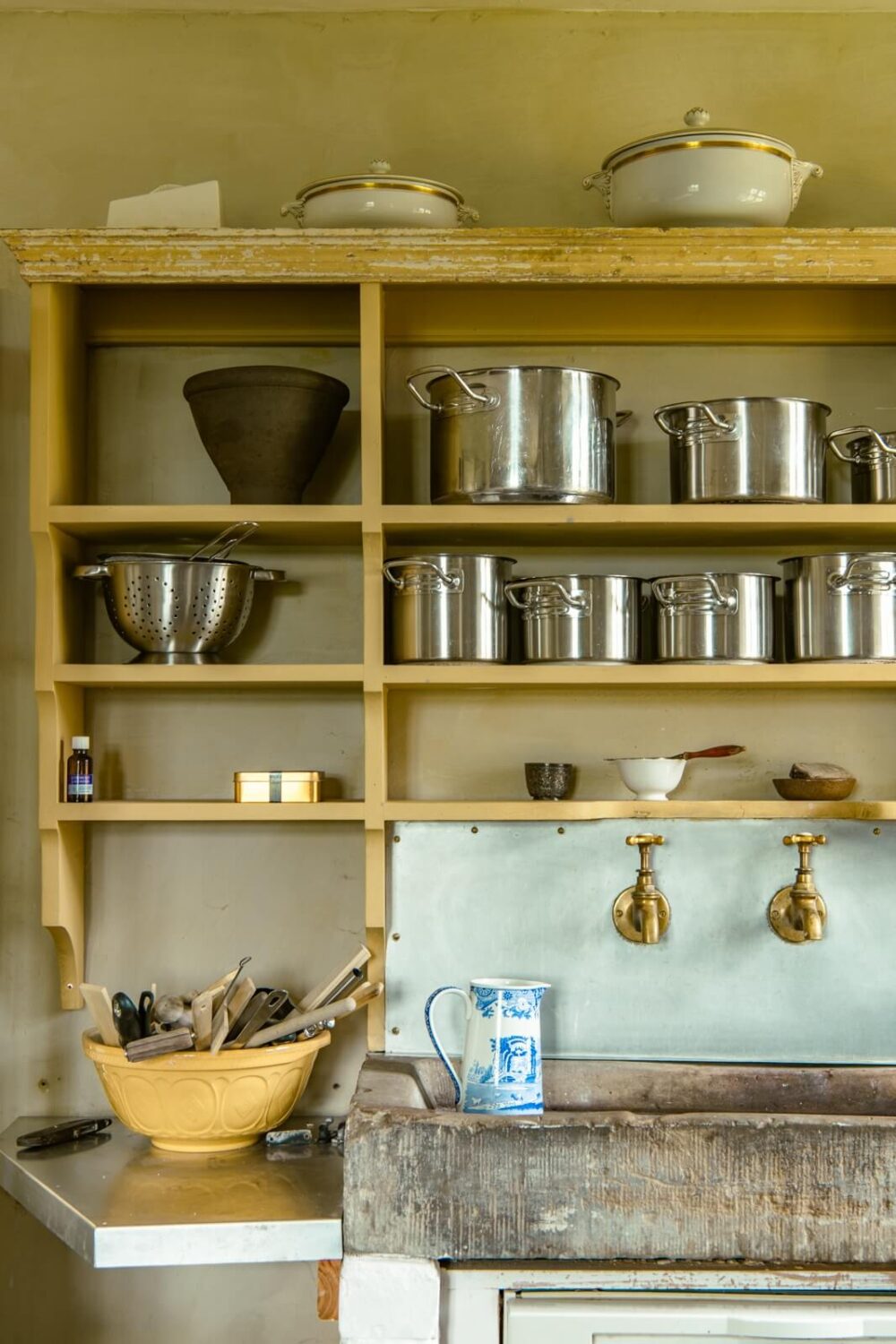 A Yellow Farmhouse with Bold Color Pops in Wales 9 farmhouse kitchen shelves