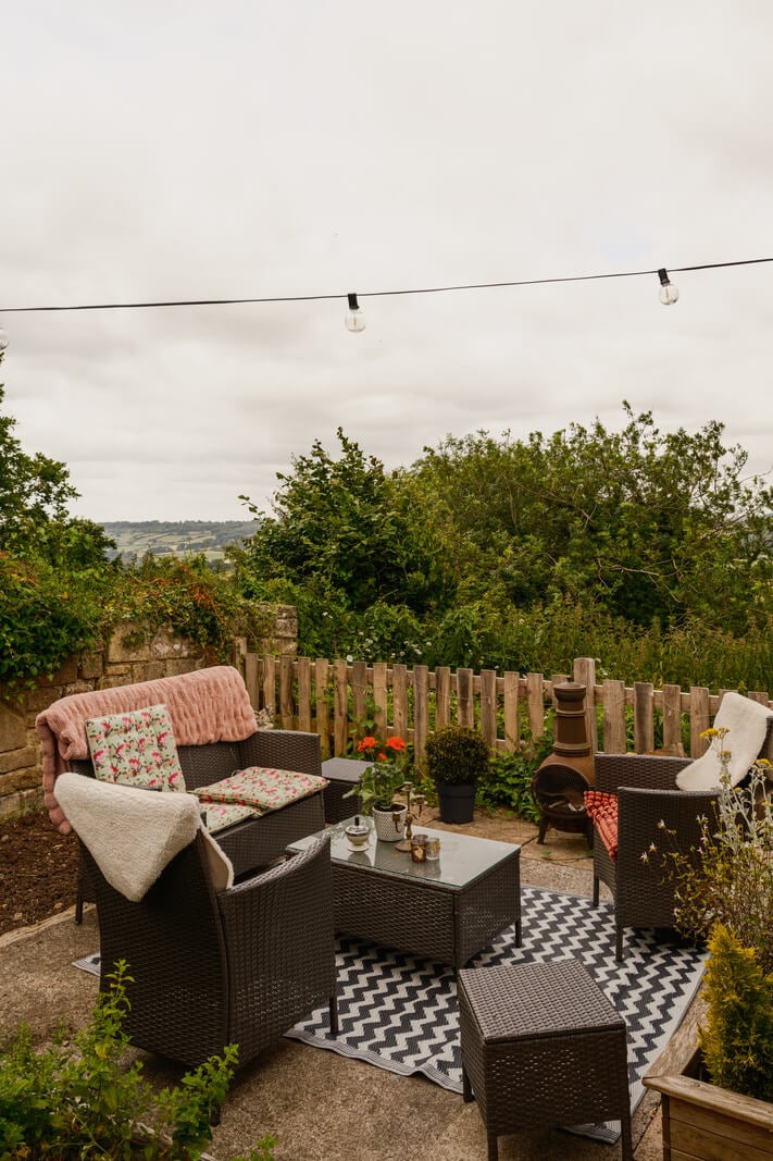 A Black Barn House with Boho Interiors and Breathtaking Views 15 garden seating