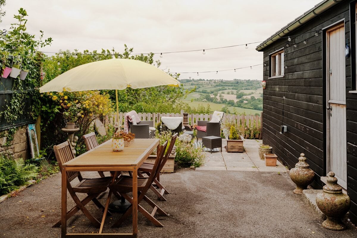 A Black Barn House with Boho Interiors and Breathtaking Views 17 garden terrace