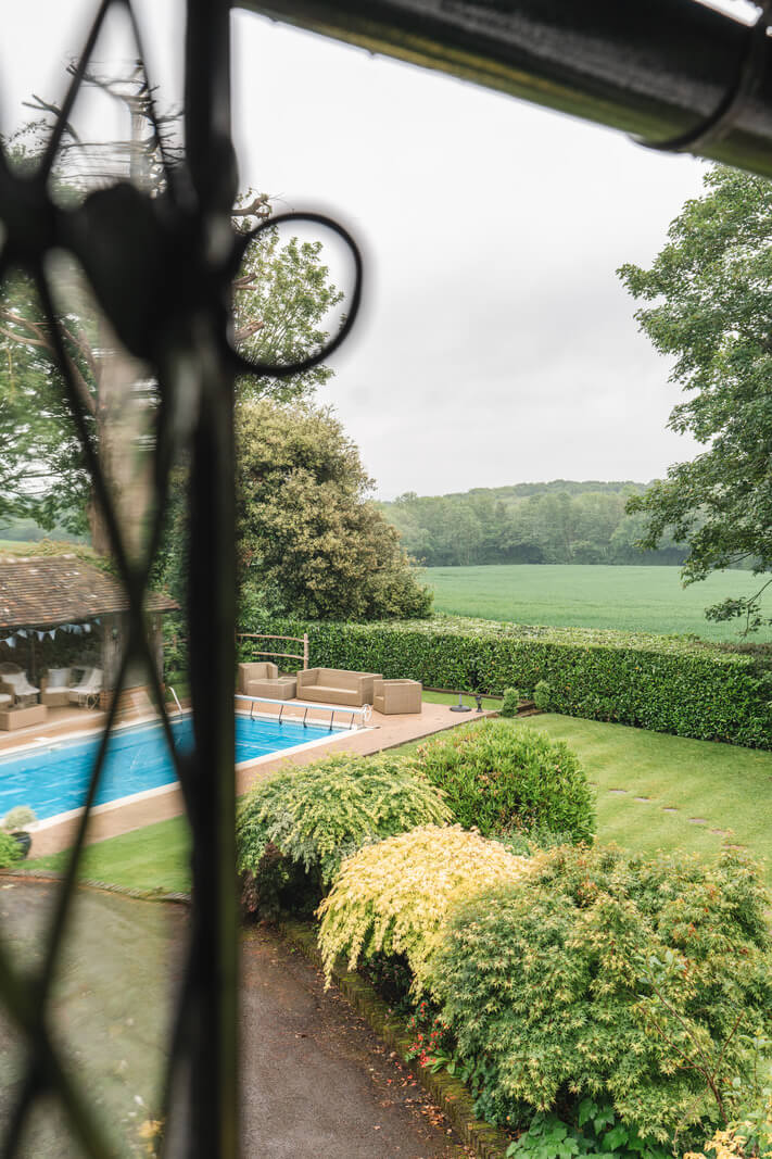 Magnificent Period Features in an English Tudor House 23 garden with swimming pool