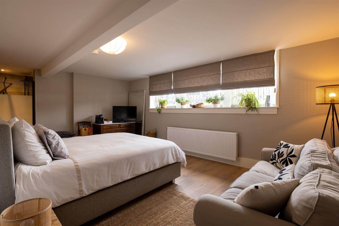 A Modern Duplex Apartment in The Netherlands 9 gray bedroom low eiling