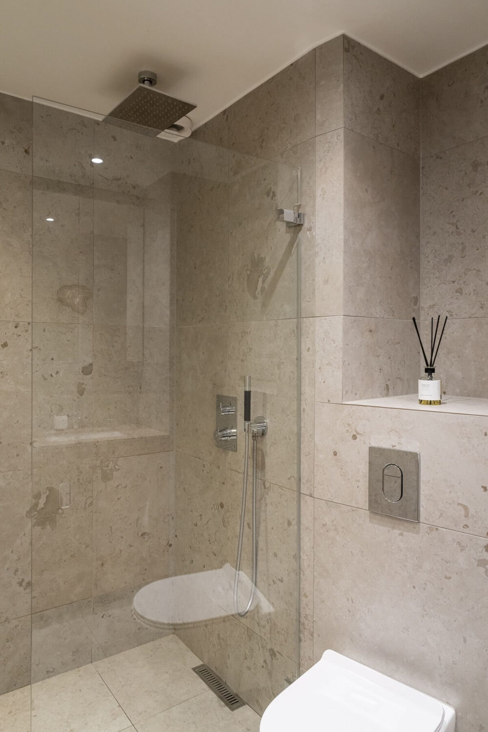 A Renovated Turn-of-the-Century Apartment with Two Bedrooms 21 gray tiles bathroom