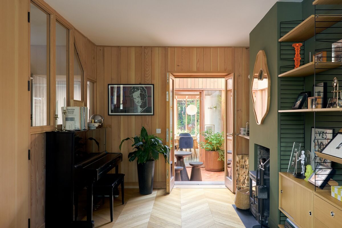 Douglas Fir and Natural Materials in a London Home 3 green and wooden walls living room