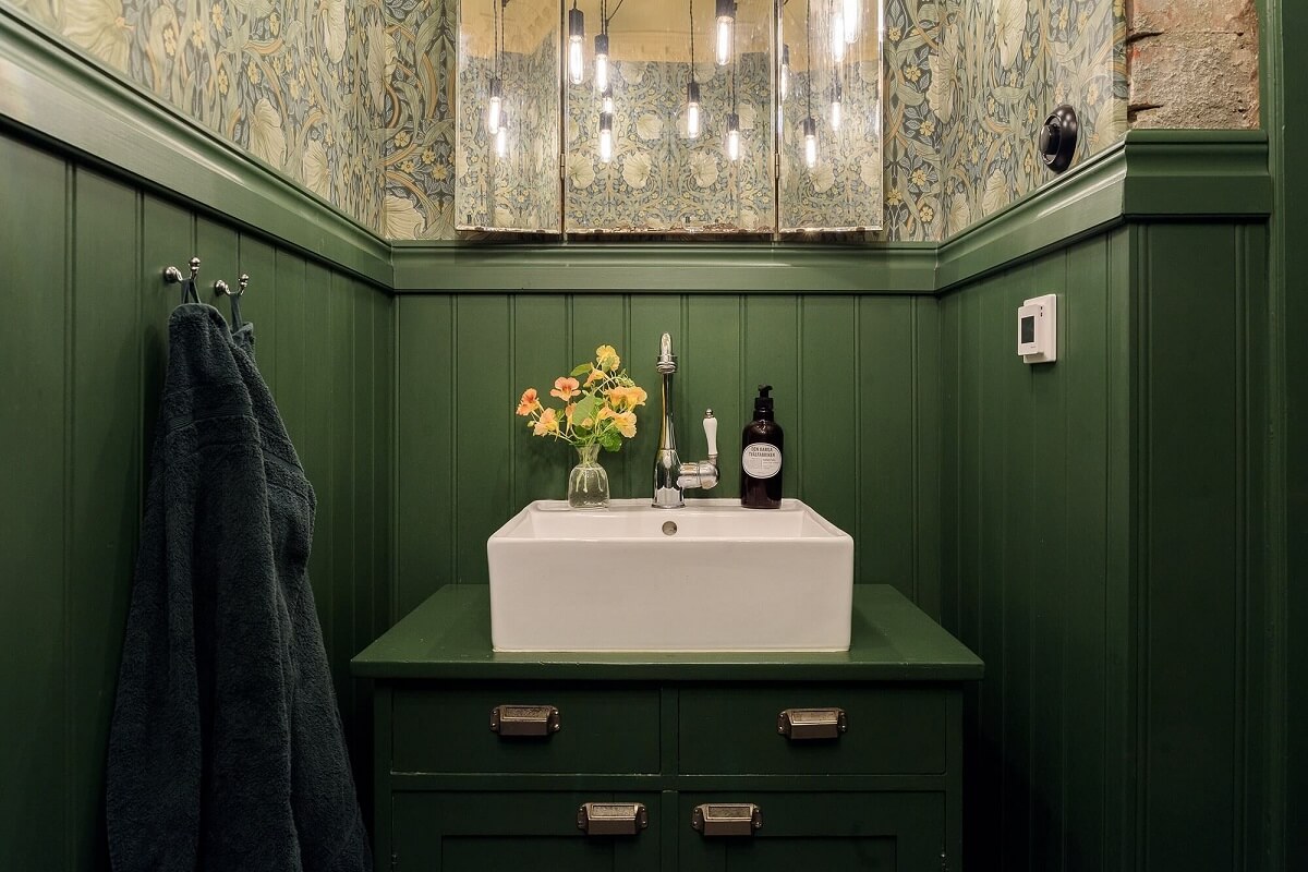 A Beautiful Family Home in a Grand 1930s Villa in Sweden 16 green bathroom