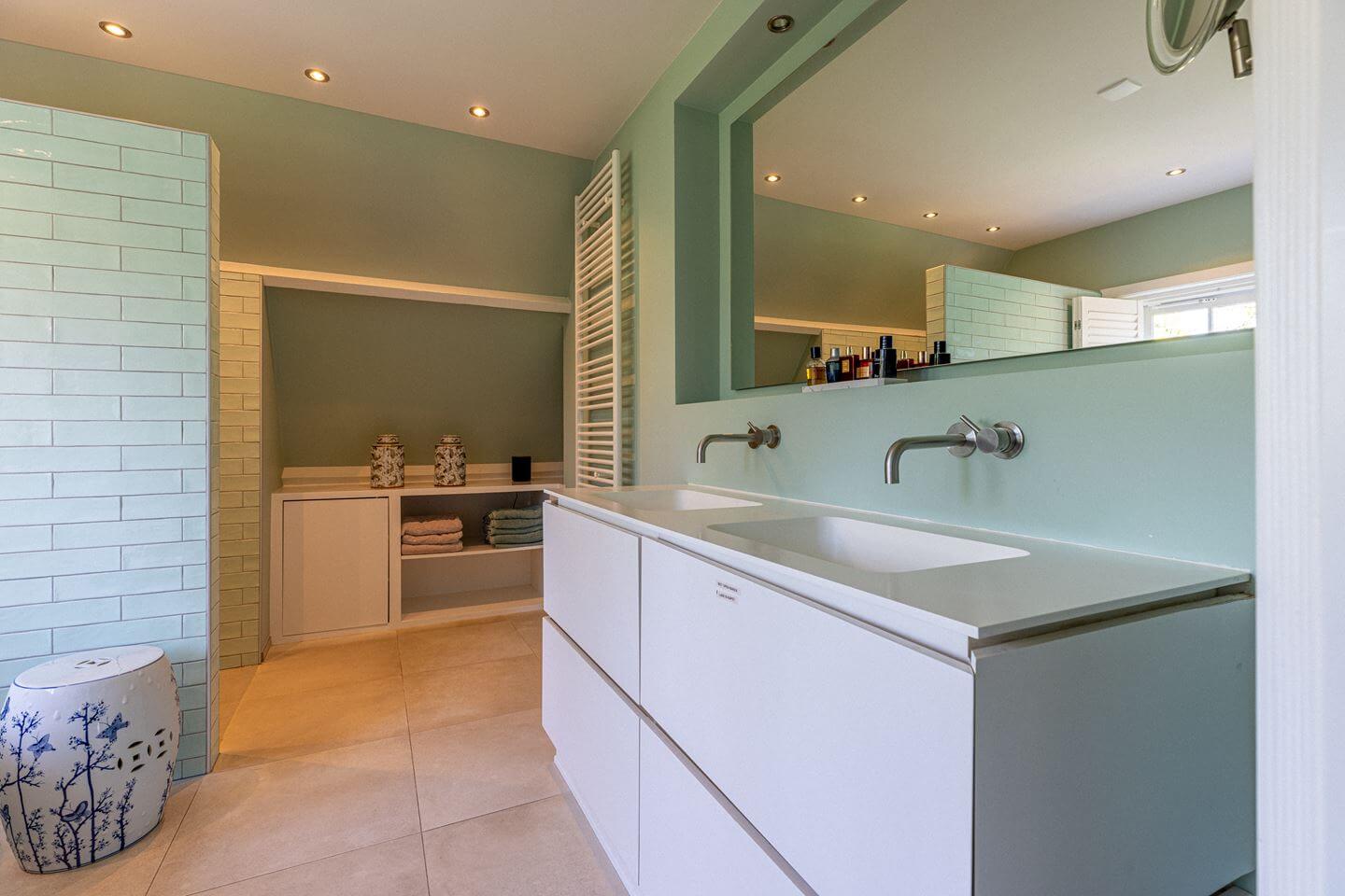 Bold Color Accents in a Dutch Family Home 20 green bathroom