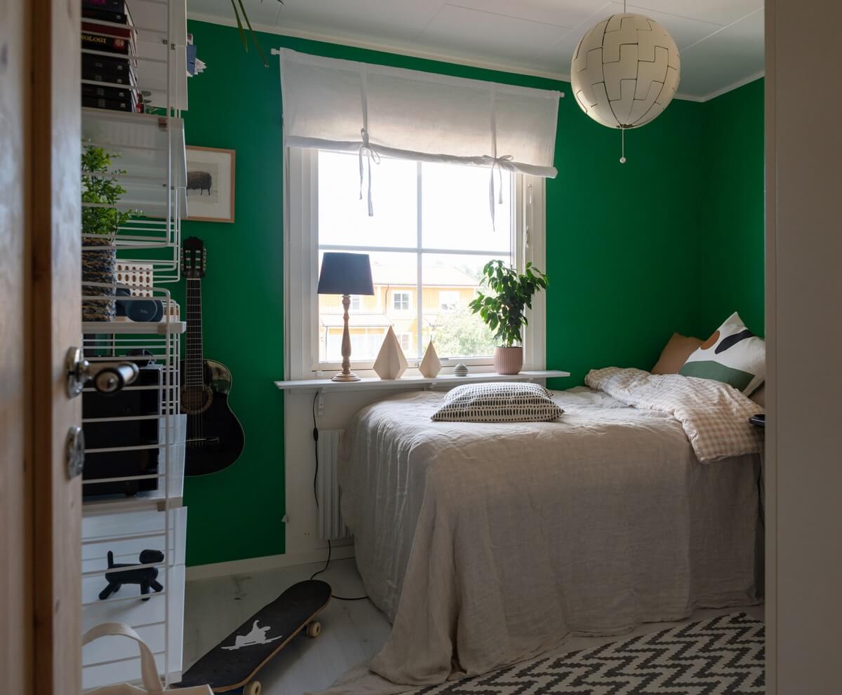 A Swedish Family Home with a Lovely Garden Room 18 green bedroom