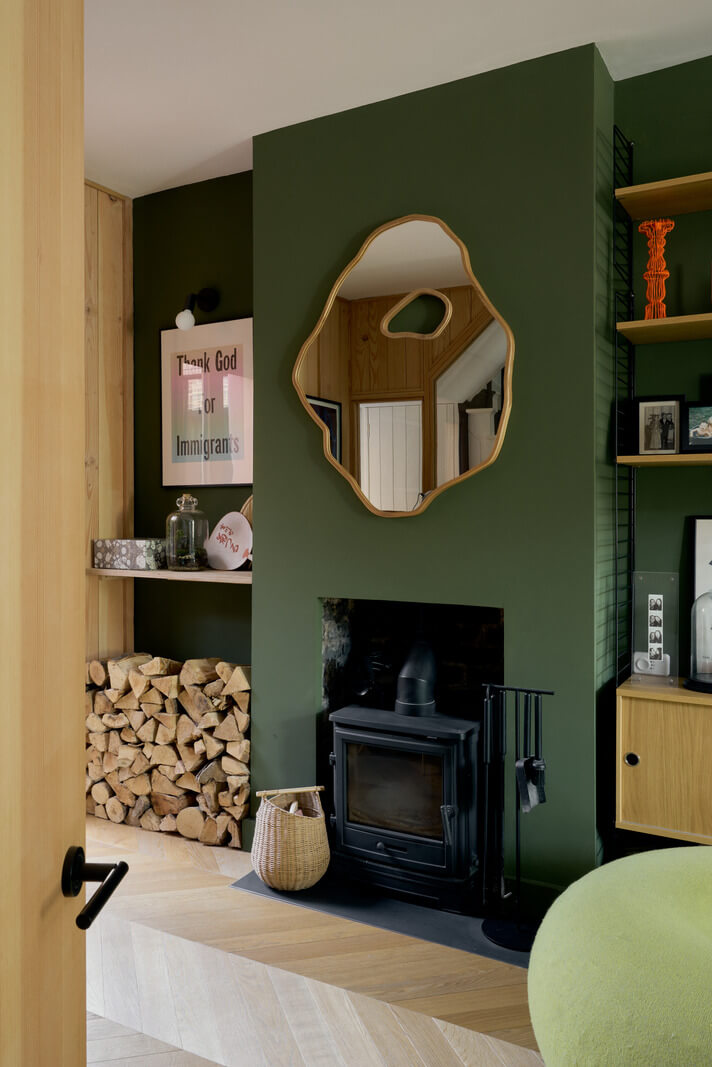 Douglas Fir and Natural Materials in a London Home 4 green fireplace with built in shelves