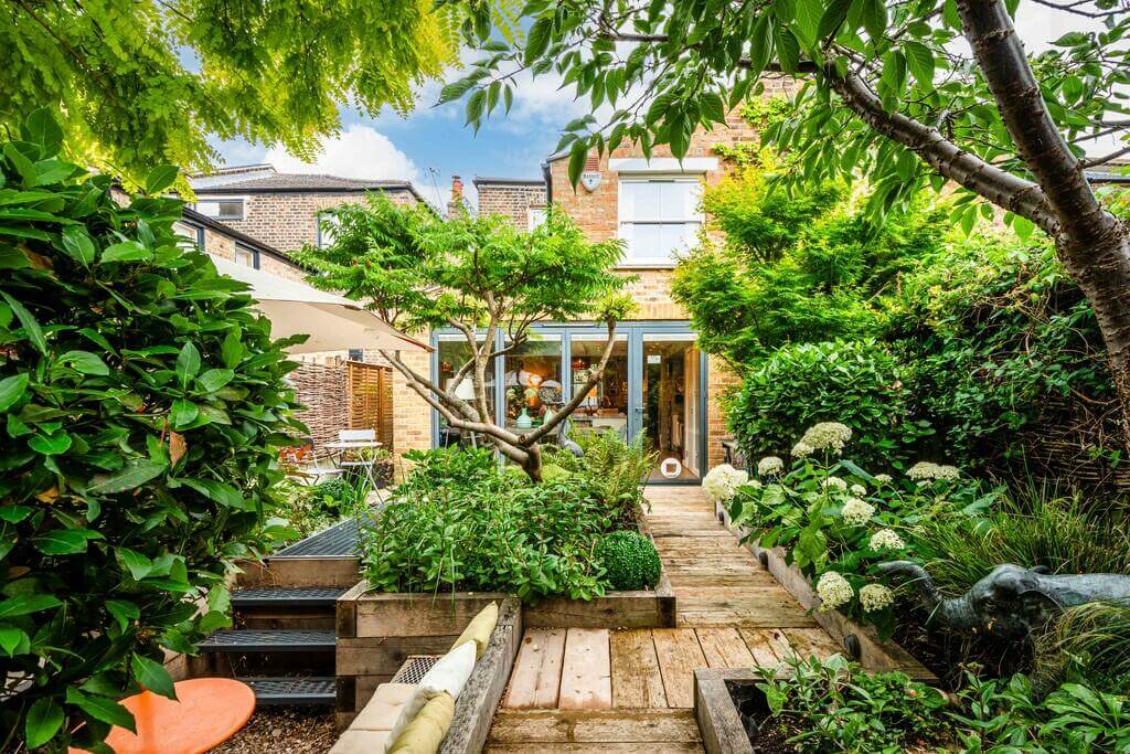 An Open Plan Victorian House with a Lush Green Garden 16 green garden An Open Plan Victorian House with a Lush Green Garden