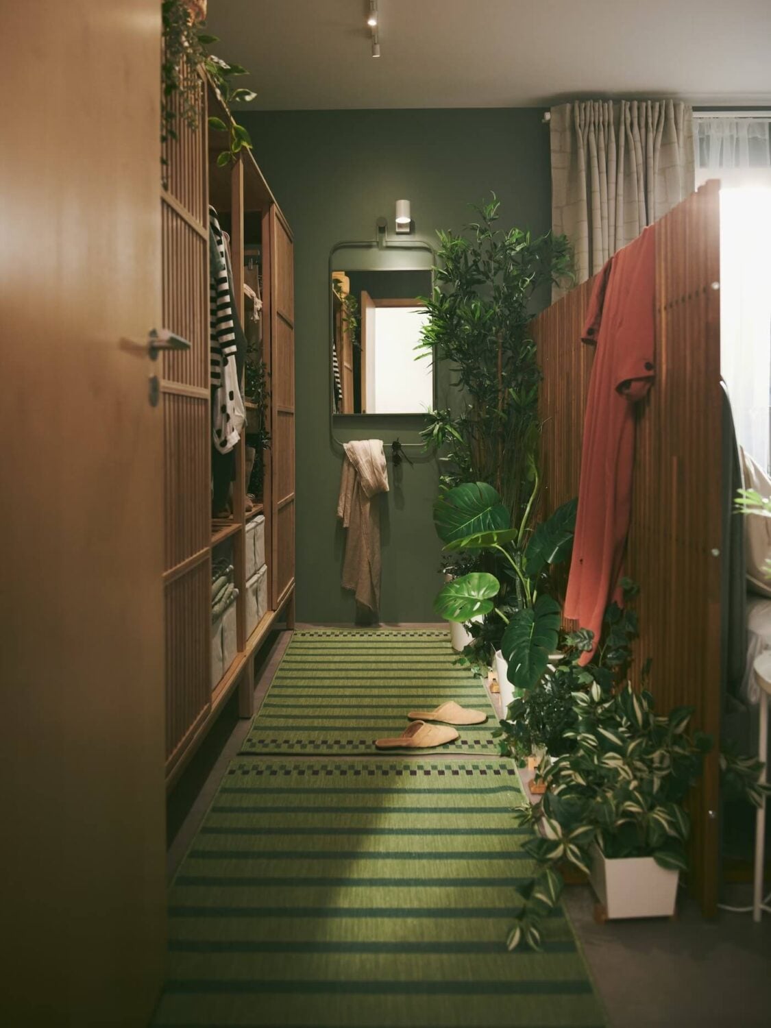 A Sage Green IKEA Bedroom with A Walk-In Closet 8 green ikea bedroom nammaro privacy screen walk in closet with granvag mirror nordroom