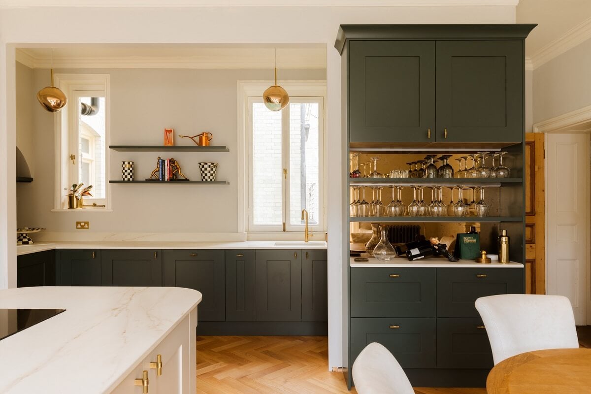 A Stylish Apartment in the Heart of London's Whitehall 11 green kitchen cupboards and home bar