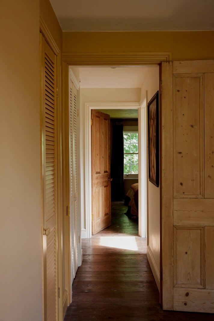 A Charming London House with an Ochre Yellow Bedroom 11 hallway