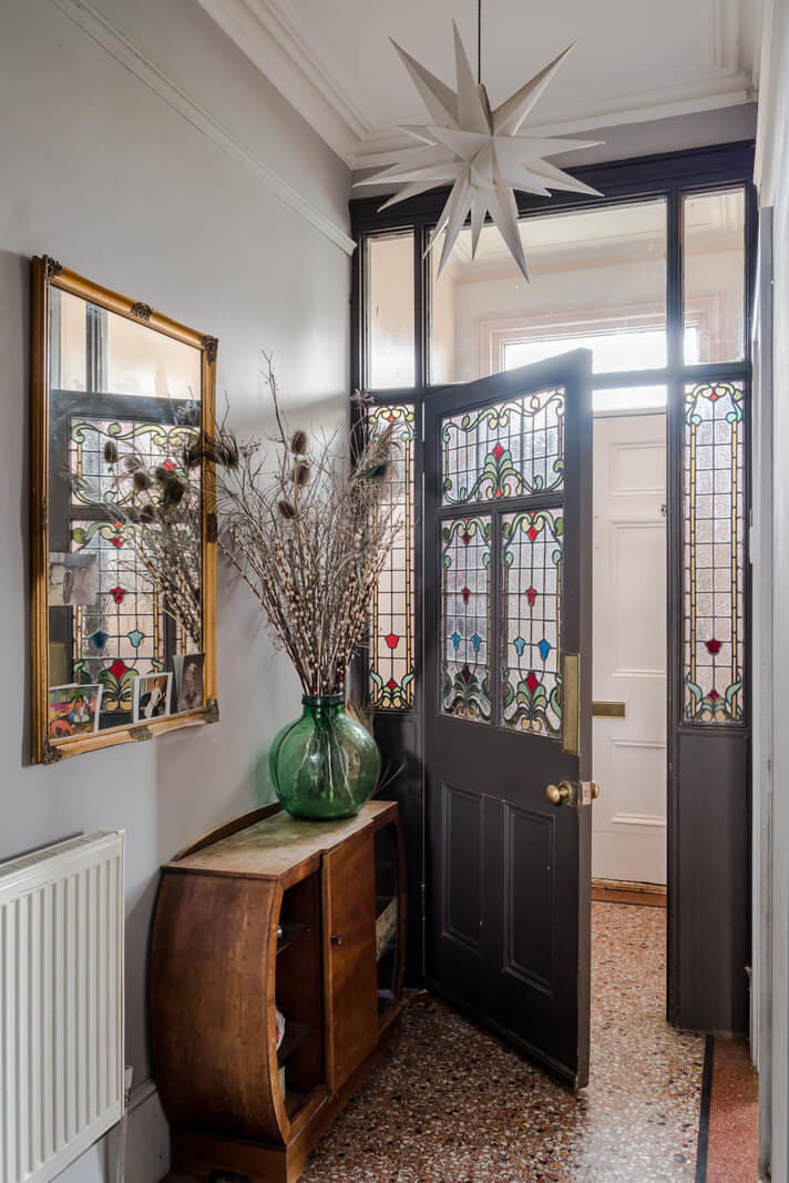 Pared-Back Interiors in a Late Victorian House 9 hallway door with stained glass nordroom