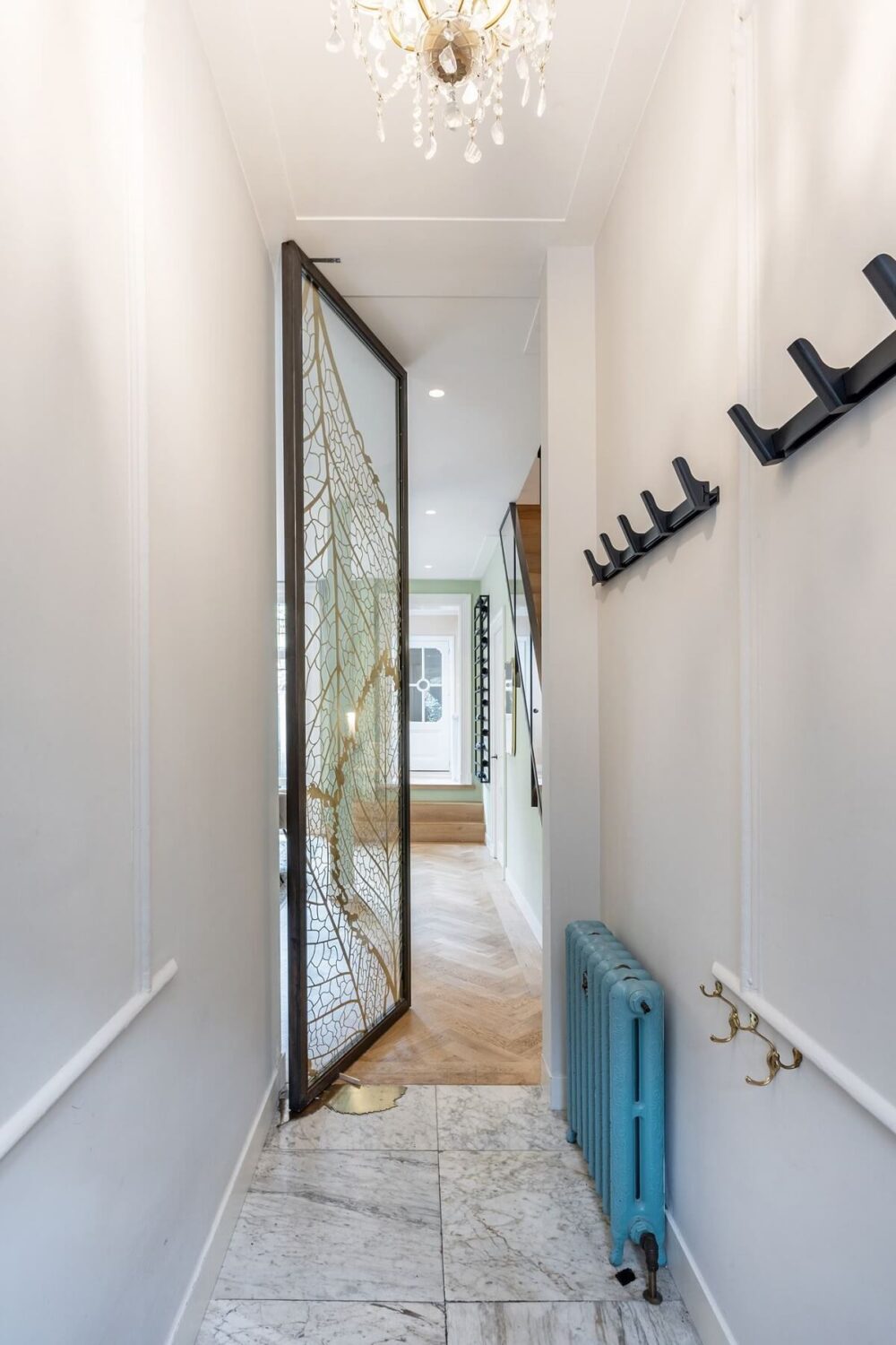 A Beautiful Renovated Duplex Apartment in Amsterdam 13 hallway marble tiles