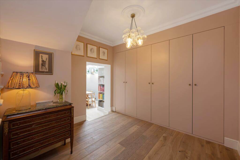 Cottage-style Interiors in a London Family Home 4 hallway with built in storage