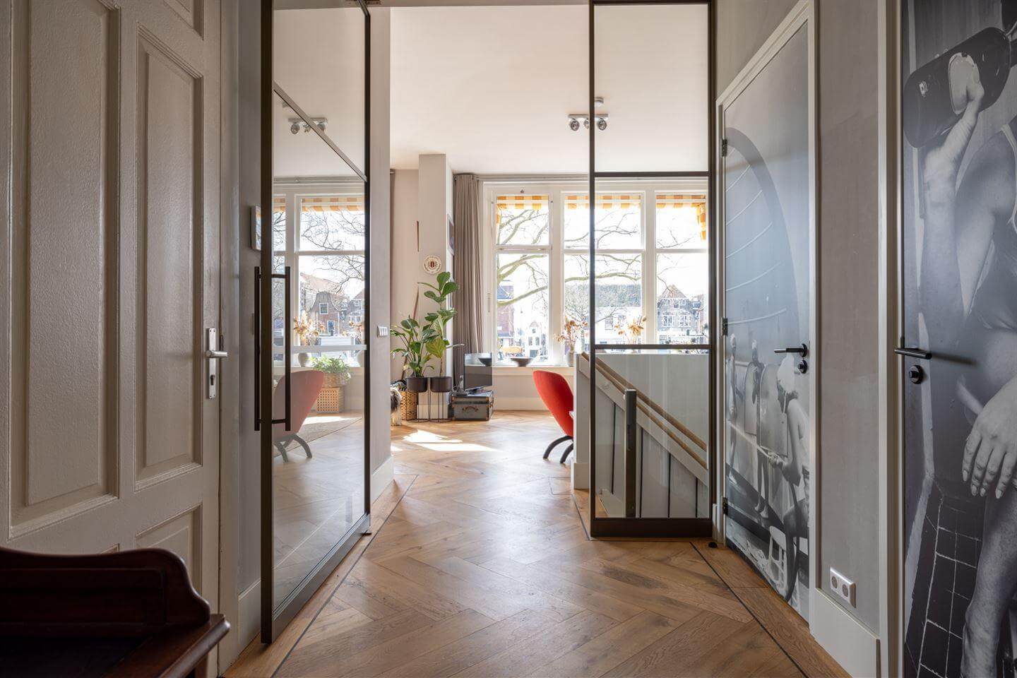 A Modern Duplex Apartment in The Netherlands 8 hallway with glass doors