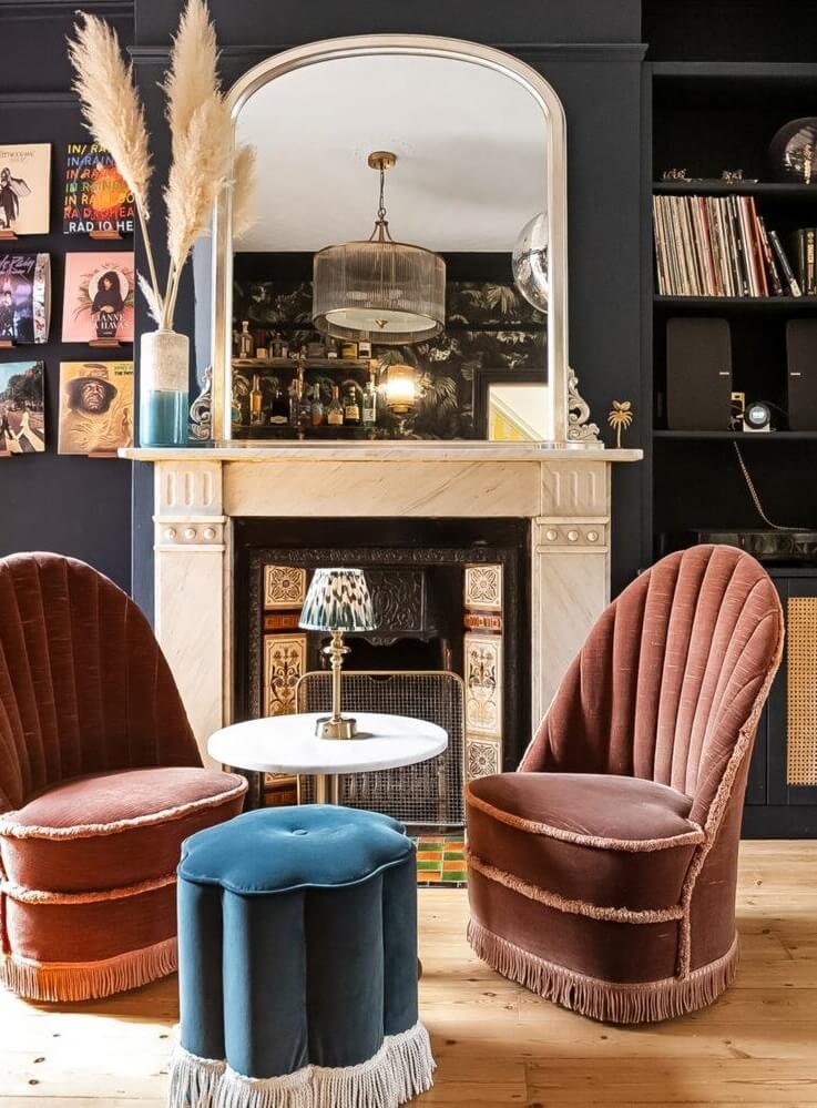 Playful Materials, Textures, and Colors in a London Home 7 home bar seating with fireplace