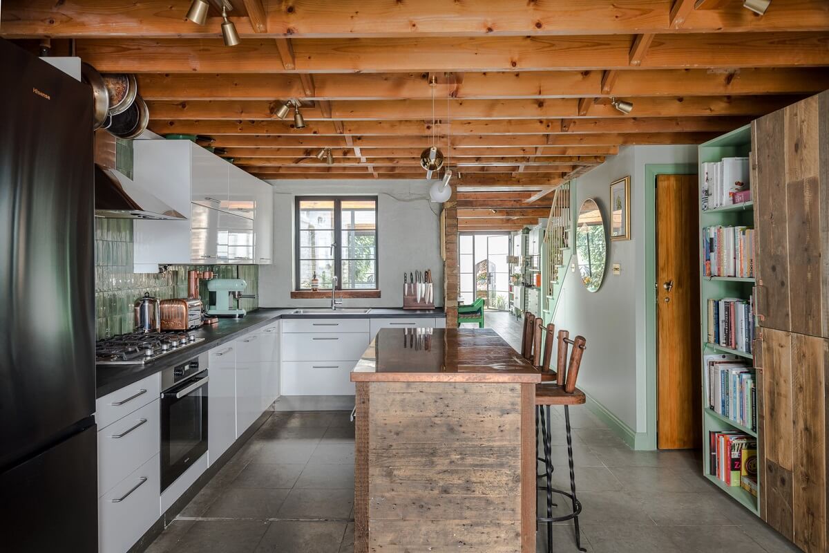 Exposed Materials and Green Tones in a London Stable Conversion 6 kitchen exposed wooden ceiling nordroom