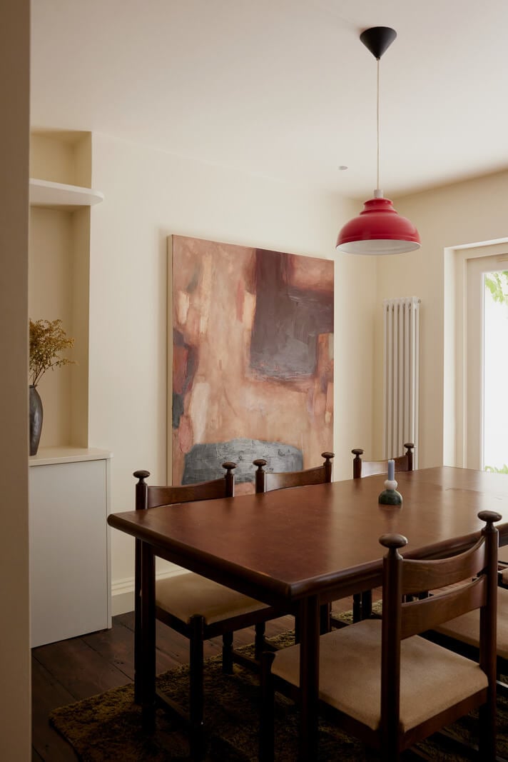 A Charming London House with an Ochre Yellow Bedroom 4 kitchen table red pendant