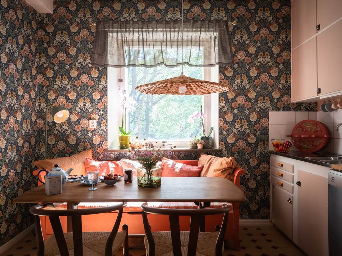 Floral Wallpaper and a Pink Kitchen in a Midcentury Apartment 14 kitchen table with wicker pendant light nordroom