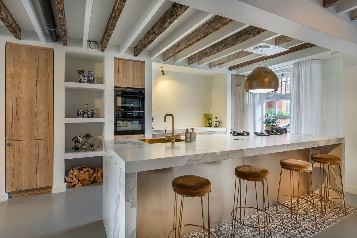 A Beautiful Loft Style Home in a Former Dutch Factory 2 kitchen wooden cabinets marble worktop