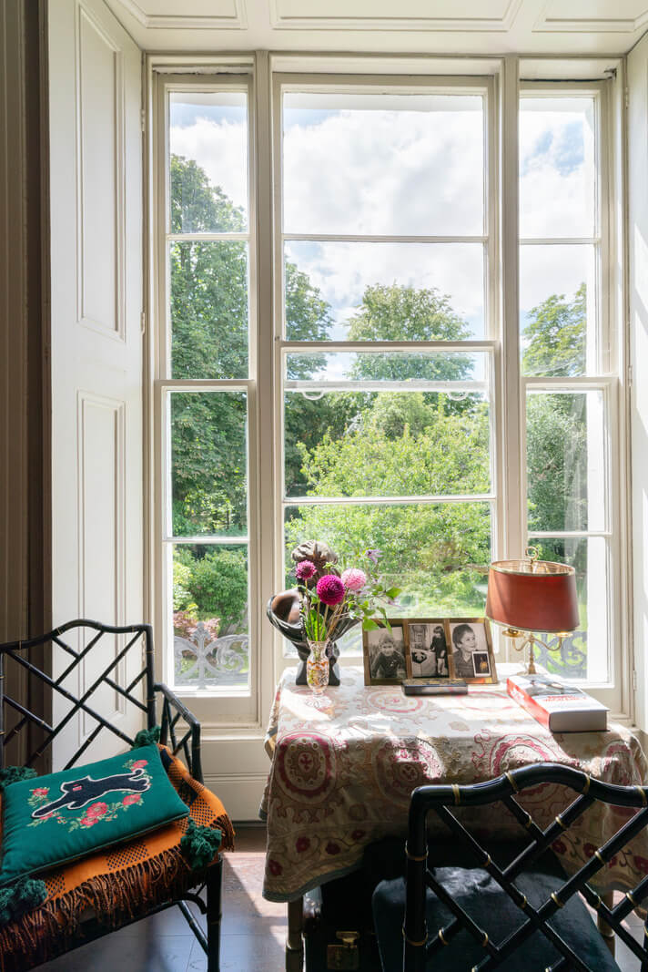 A Moody Color Palette and Eclectic Interiors in a London Apartment 14 large windows