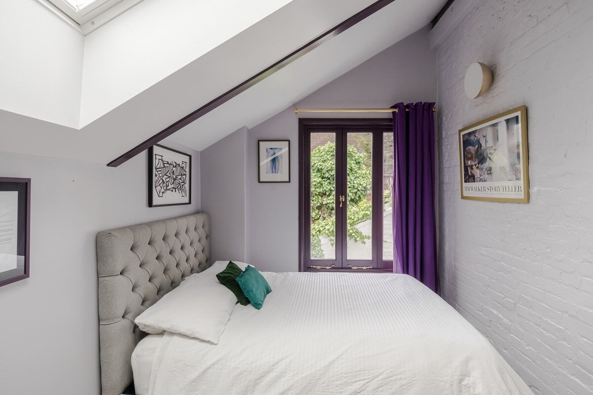 Exposed Materials and Green Tones in a London Stable Conversion 14 light gray bedroom pitched ceiling