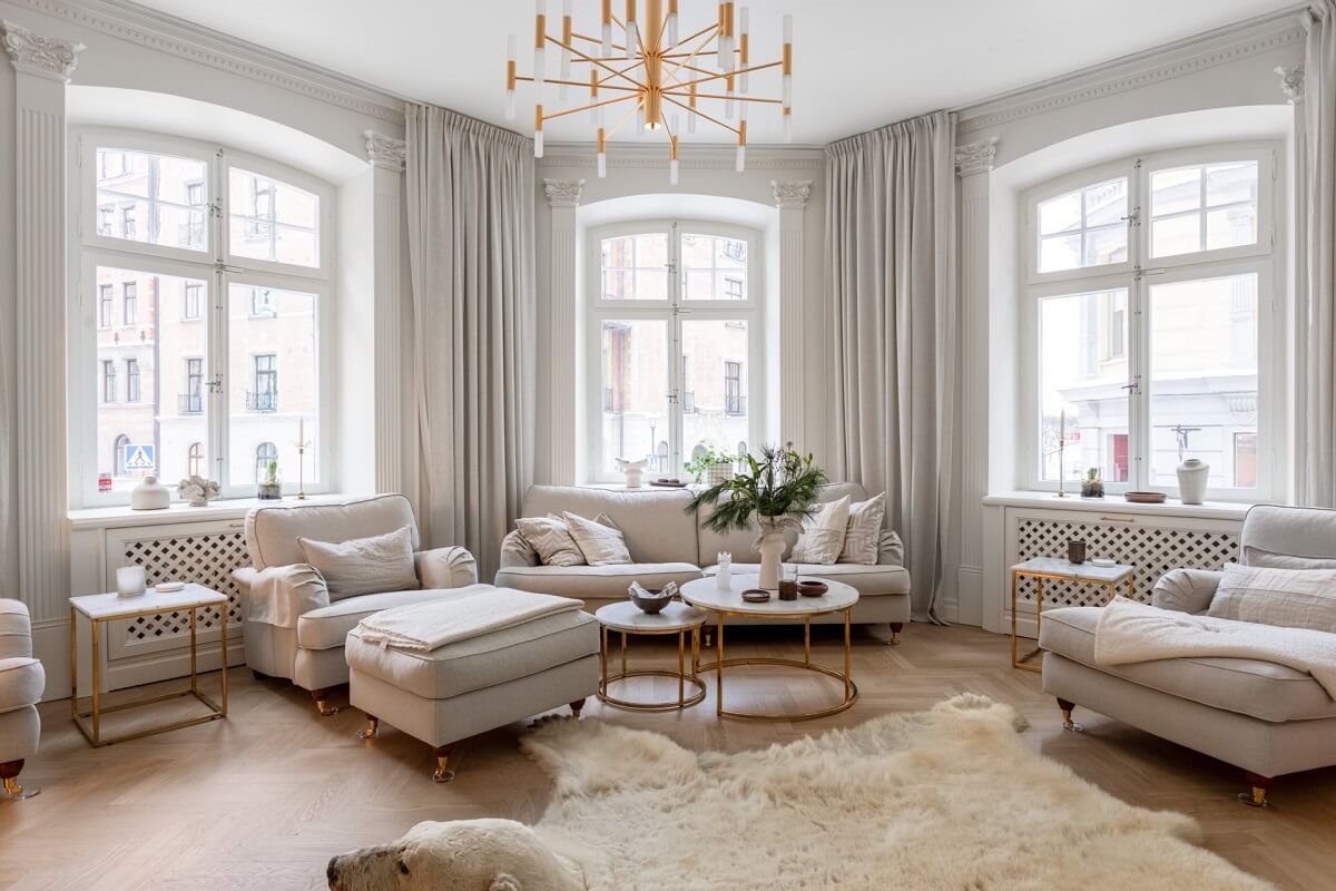 A Luxurious Stockholm Apartment with Period Features 9 light living room large windows