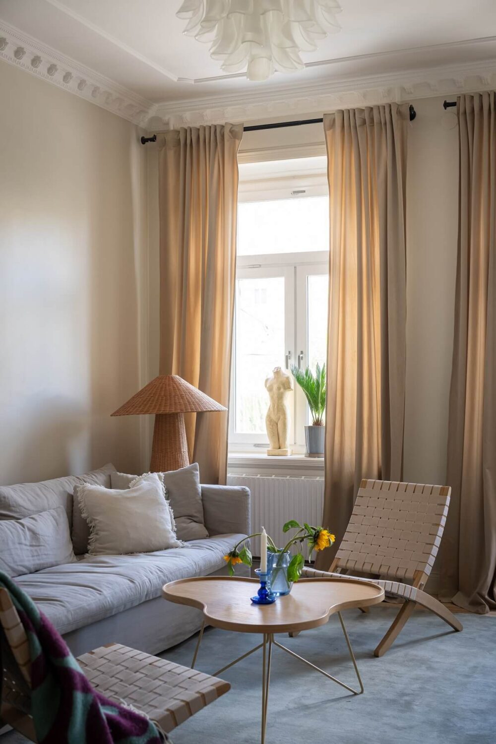 A Renovated Turn-of-the-Century Apartment with Two Bedrooms 5 living room blue rug