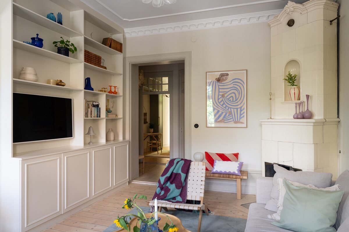 A Renovated Turn-of-the-Century Apartment with Two Bedrooms 2 living room built in cabinets