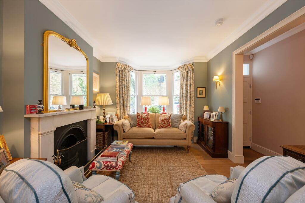 Cottage-style Interiors in a London Family Home 1 living room eggblue wall fireplace