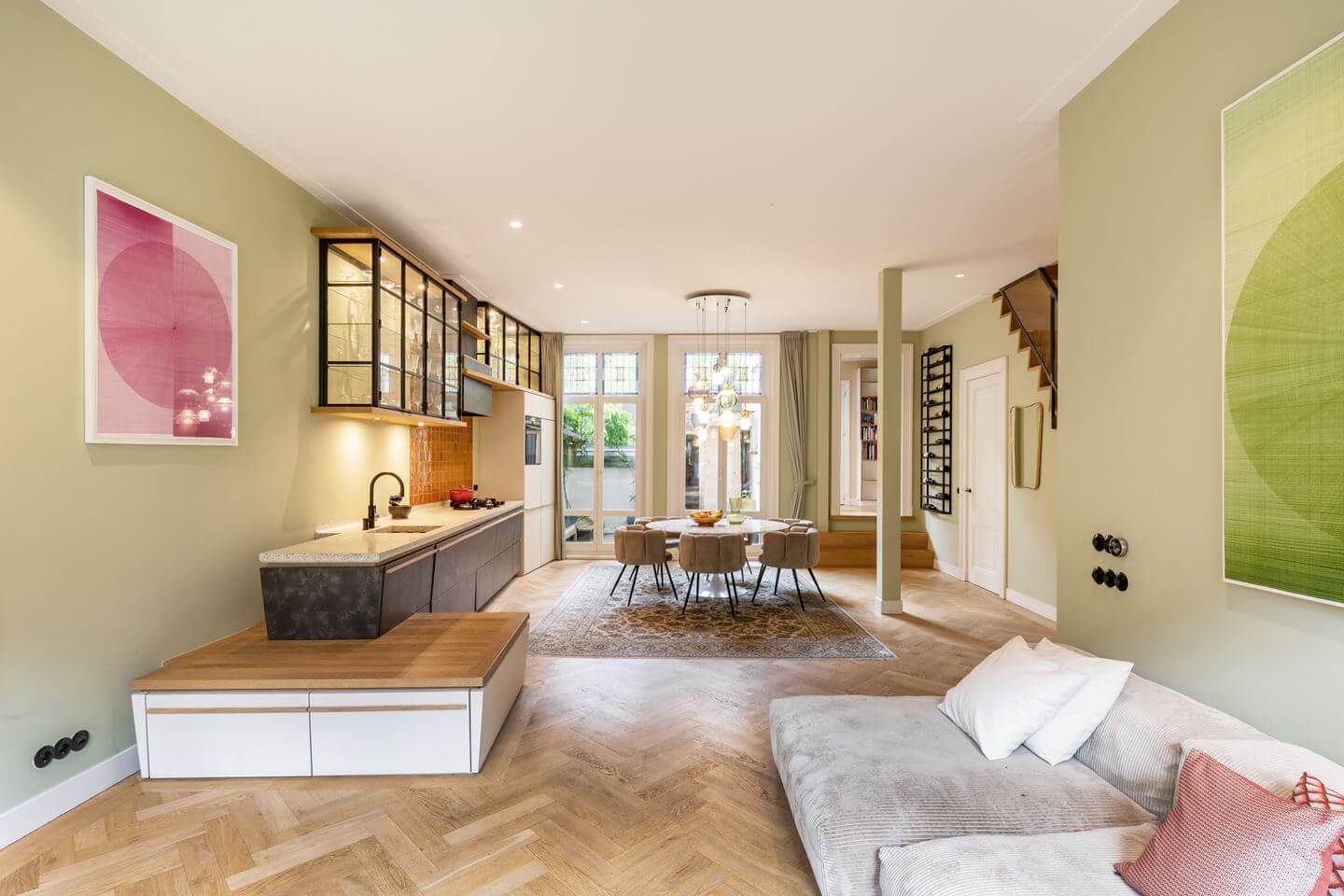 A Beautiful Renovated Duplex Apartment in Amsterdam 1 living room light green walls