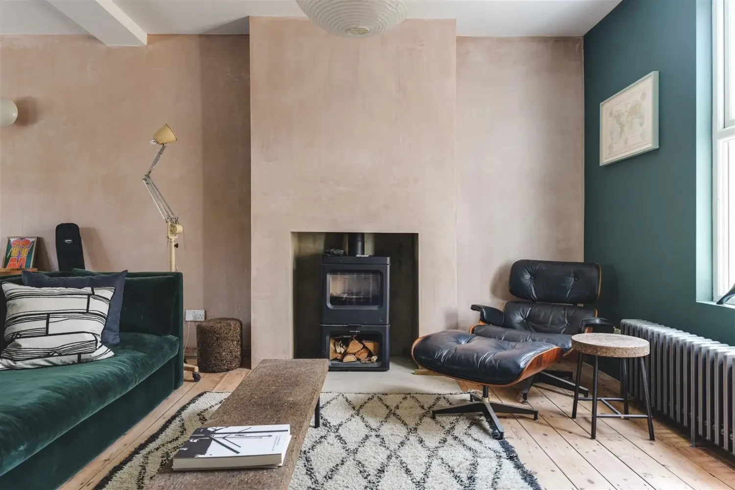 Open-Plan Rooms and Modern Furnishings in a London Home 2 living room pink plaster wall wood burner